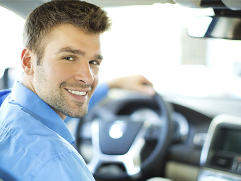 Driver looking over his shoulder at a passenger